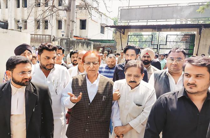 As Azam Khan reached the court in Rampur, he was surrounded by media representatives. (Photo: PTI)